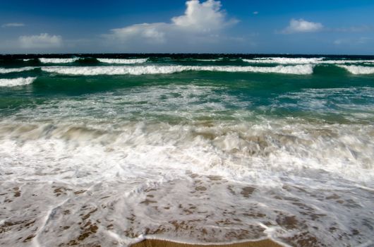 It is a beautiful beach with big waves in Taiwan.