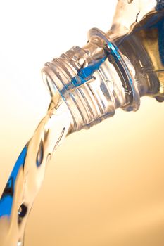 stream of water flows from the bottle