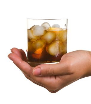 Carbonated water with ice in a glass isolated on white background