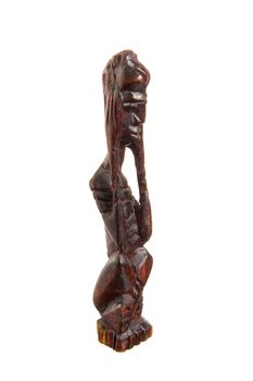 African statue of black wood isolated on white background