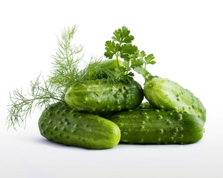 handful of fresh cucumbers with parsley and dill