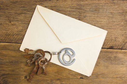 letter on the background of old wooden planks