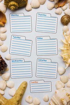 Calendar for the week is framed seashells