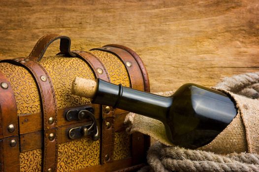 Pirate treasure chest against the old wooden boards