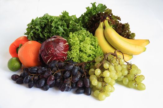Fruits and vegetables on white background.
