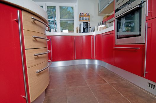 Shot of beautiful red modern kitchen, interior