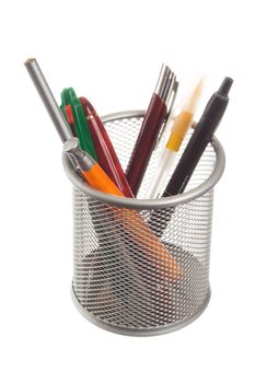 basket with pens and pencils isolated on a white background