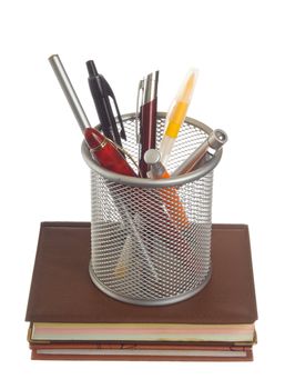 basket with pens and pencils isolated on a white background