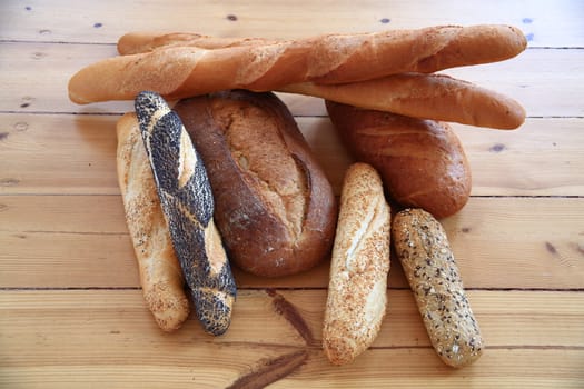 Close-up of fresh bakery on wooden background