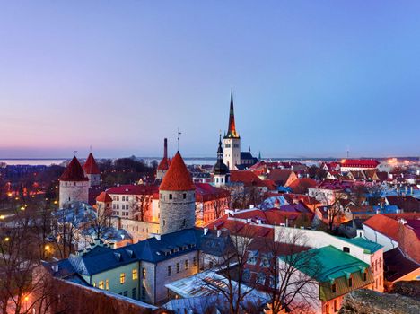 Capital of Estonia, Tallinn is famous for its World Heritage old town walls and cobbled streets. The old town is surrounded by stone walls and distinctive red roofs and glows at dusk
