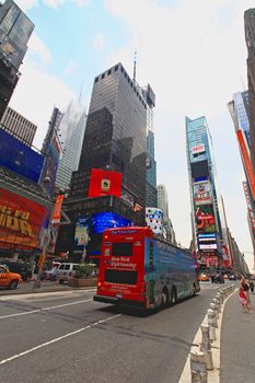 The famous Times Square at Mid-town Manhattan - a wide angle view