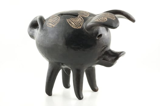 Black ceramic piggy bank, on white backgroun.