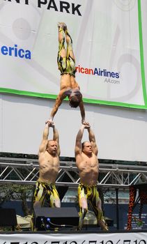 NEW YORK - JULY 31: The cast of  Cirque Dreams Jungle Fantasy performed at The Broadway in Bryant Park in NYC - a free public event on July 31, 2008  