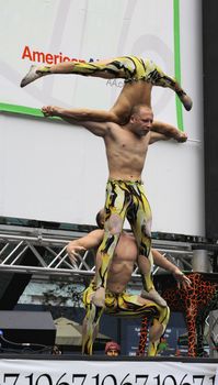 NEW YORK - JULY 31: The cast of  Cirque Dreams Jungle Fantasy performed at The Broadway in Bryant Park in NYC - a free public event on July 31, 2008  