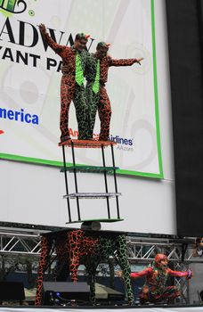 NEW YORK - JULY 31: The cast of  Cirque Dreams Jungle Fantasy performed at The Broadway in Bryant Park in NYC - a free public event on July 31, 2008  