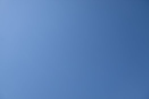 Clear blue sky with the sun light coming from the upper left