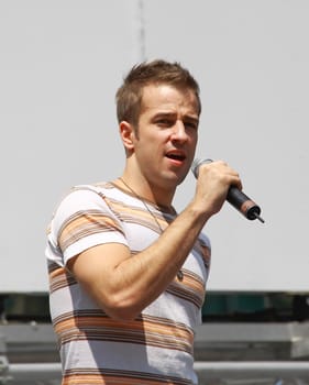 NEW YORK - AUGUST 7: Curtis Holbrook performed Xanadu at The Broadway in Bryant Park in NYC - a free public event on August 7, 2008   