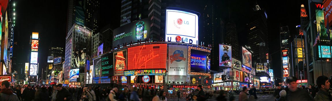 The tourists crowded in the Times Square in Manhattan on Dec 29, 2008 - panorama view