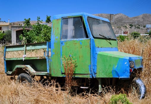 Abandoned vehicle in rural area, island of Crete.