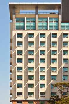 Apartment building with many windows at a university campus