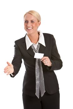 Attractive young businesswoman extending a hand and holding her businesscard ready