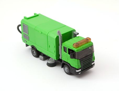 children's toy garbage in green on a white background