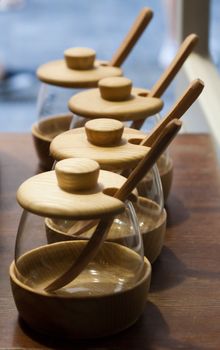 Four glass jars with a wooden lid, hand-made in Prague