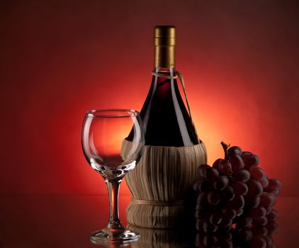 Red wine, glass and bottle