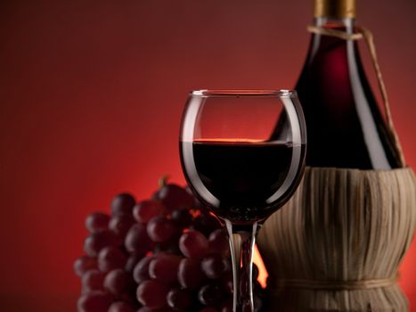 Red wine, glass and bottle