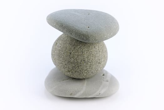 a stack of stone on white