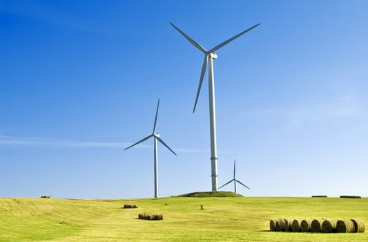 wind turbine s in a harvested field