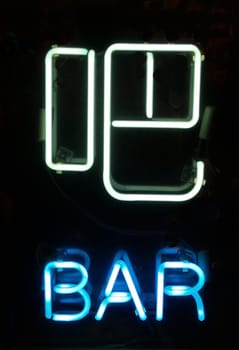 a Neon sign of bar in Chinese - learn Chinese