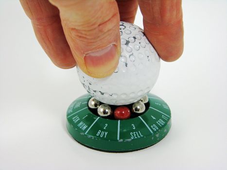Ready to spin a golf ball used as an executive decision maker.