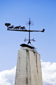 Weathercock with horses over a traditional chimney, Portugal