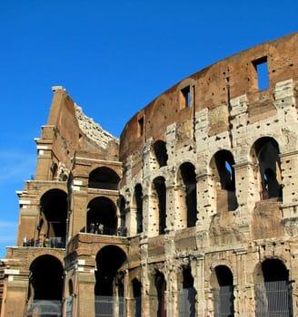 A side view of the Rome Coliseum.
