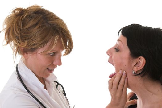 Female doctor checking out the tonsils of her patient