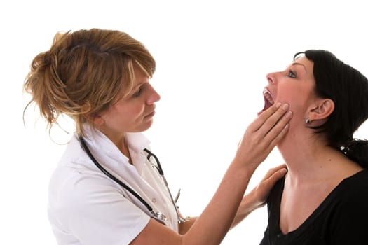 Nurse checking the mouth of her patient on white background