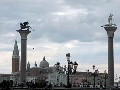 Clouds move over Venice with San Giorgio island and church in the distance. View is from the edge of St. Mark's Square.