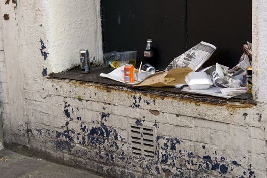 Rubbish left on a wall in an urban environment