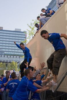 Rangers Fans jumping off a truck in piccadilly gardens