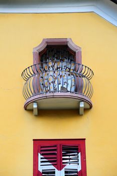 Decorated Closed Windows Of Old Building In Pisa, Italy