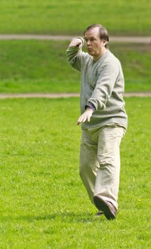 tai chi exercises most often done in the greenery, the park