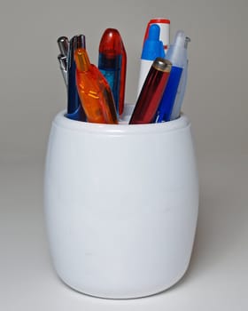 A pen holder under white background