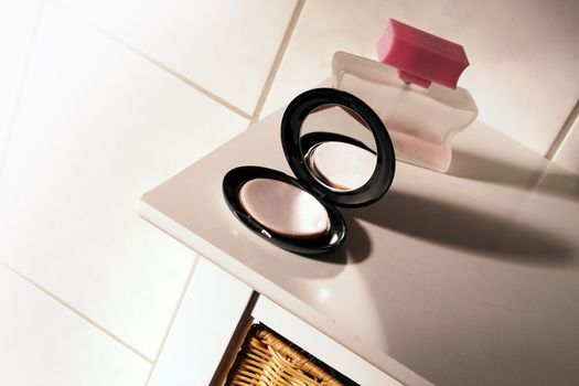 black makeup box on a white table in the bathroom