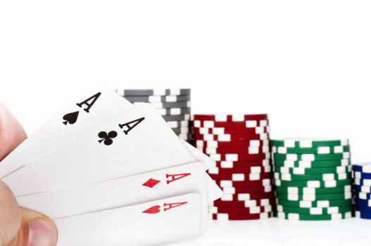 Poker of aces in hand isolated on white background