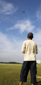 A man flying a kite.