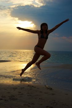 A woman early in the morning on the sea