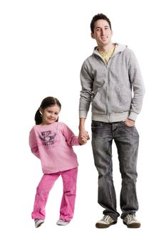 An adult holding a young girls hand on a white background