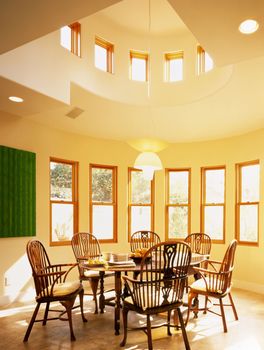 Dining Room Surrounded By Windows