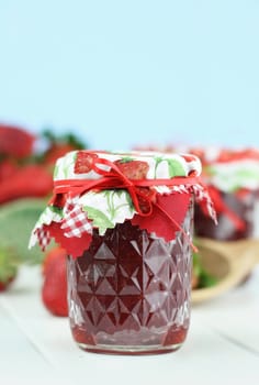 Fresh homemade strawberry preserves withextreme shallow depth of field. Copy space available.